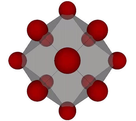 Fourteen unit-diameter nuclei (red spheres) centered on the vertices of a nucleated 3F rhombic dodecahedron.