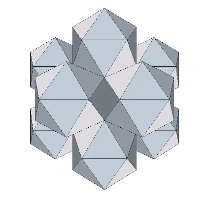 Twelve regular icosahedra forming a icosahedral shell around their common center, a void in the shape of a pentagonal dodecahedron with concave faces. 
