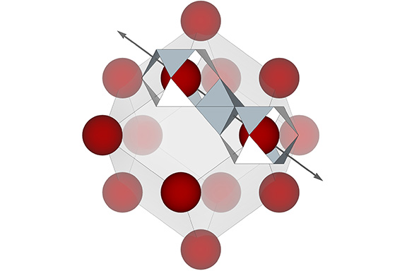 Fourteen nuclei distributed at the vertices of a rhombic dodecahedron with an edge length of four sphere-diameters. One edge is shown to coincide with an axis running through the the centers of opposing triangular faces of VEs enclosing the nuclei at each vertex with an octahedron between them.