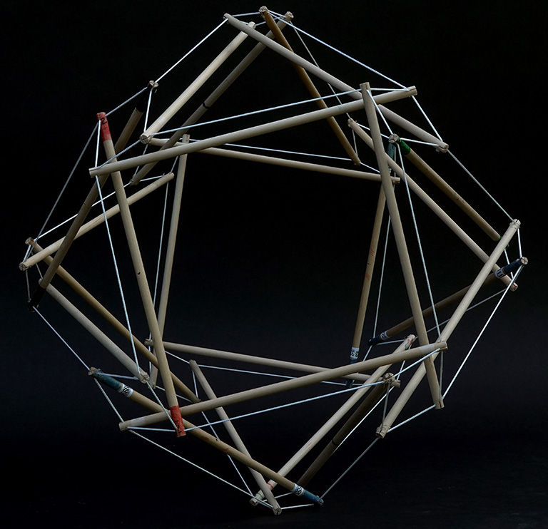 Model of the 24-strut tensegrity sphere in its transformation to the vector equilibrium (VE).